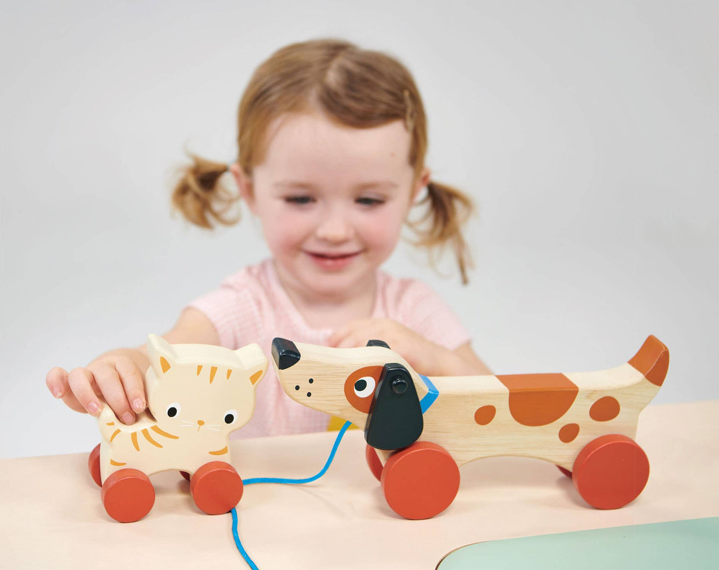 ThreadBear Tender Leaf Wooden Toy Puppy On Wheels For Kids